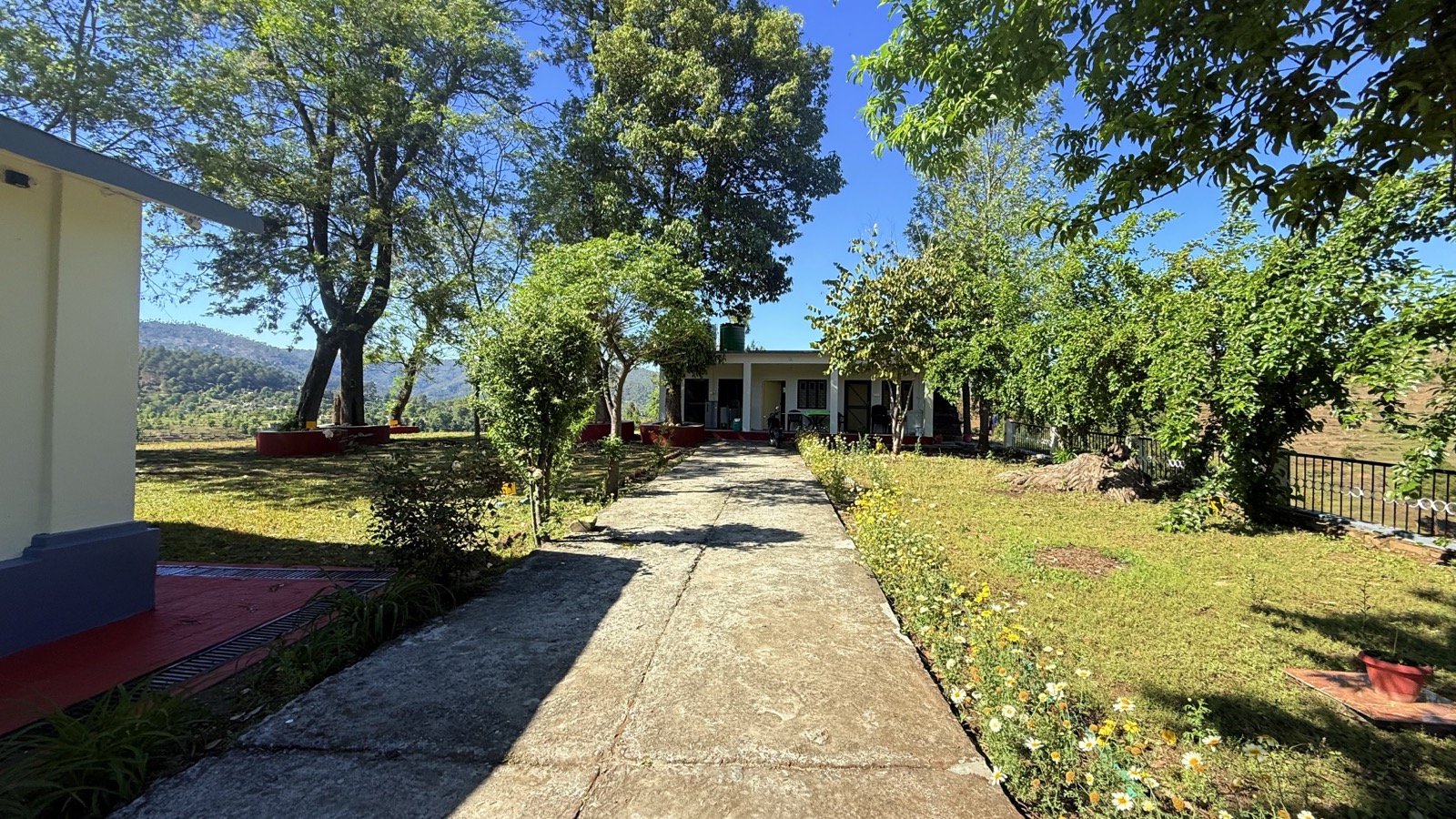 Doi Stays Dak Bungalow exterior with garden pathway